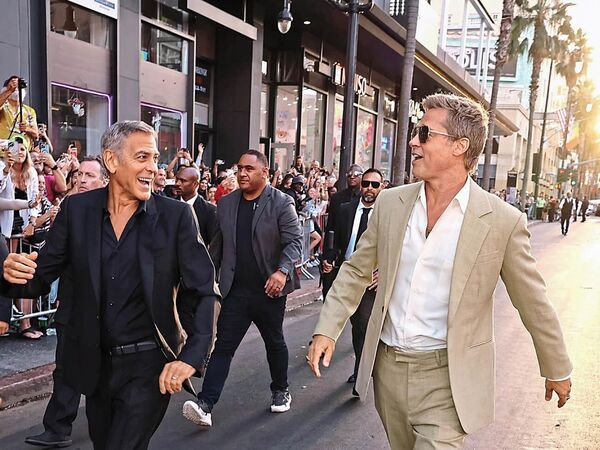 George Clooney and Brad Pitt Reunite: Highlights from the LA Premiere of 'Wolfs'